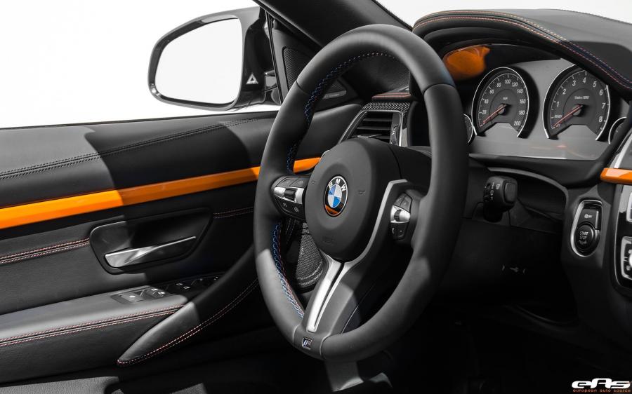 Детали интерьера BMW M4 Convertible Individual Fire Orange by EAS 2016 года  (фото 4 из 25)